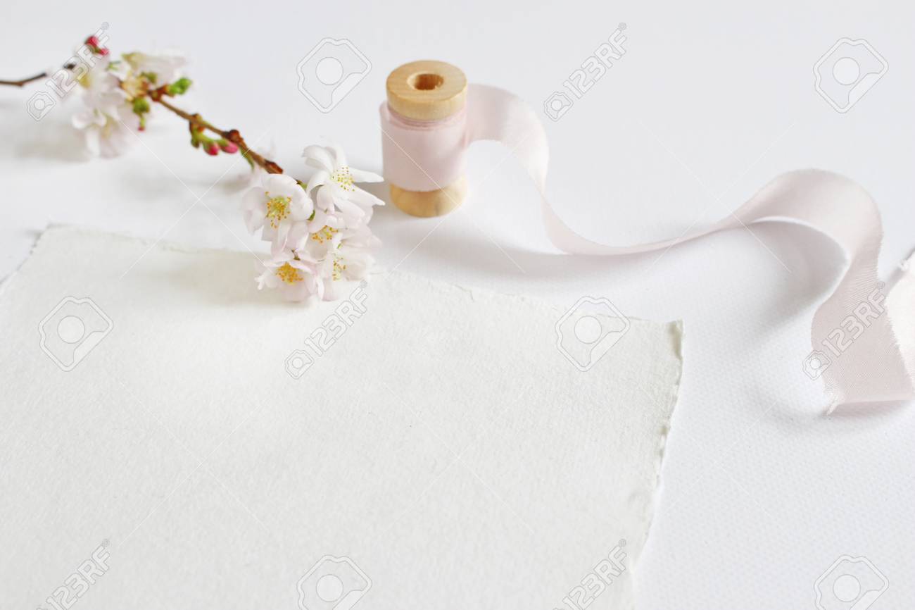 bright feminine spring stationery mockup scene with a handmade flower stationery