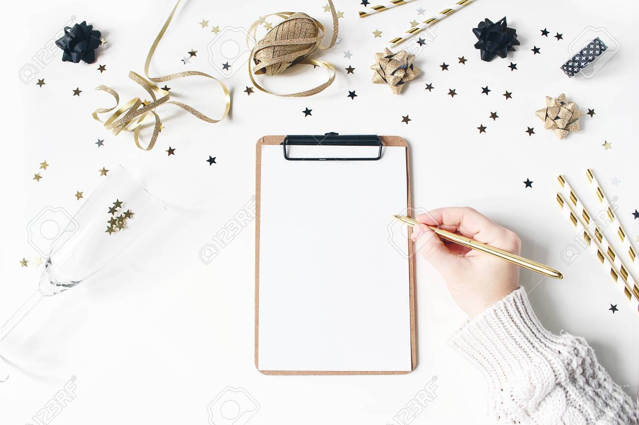 Download Female Hand In Sweater And Writing New Year Resolution Wish Stock Photo Picture And Royalty Free Image Image 133567334