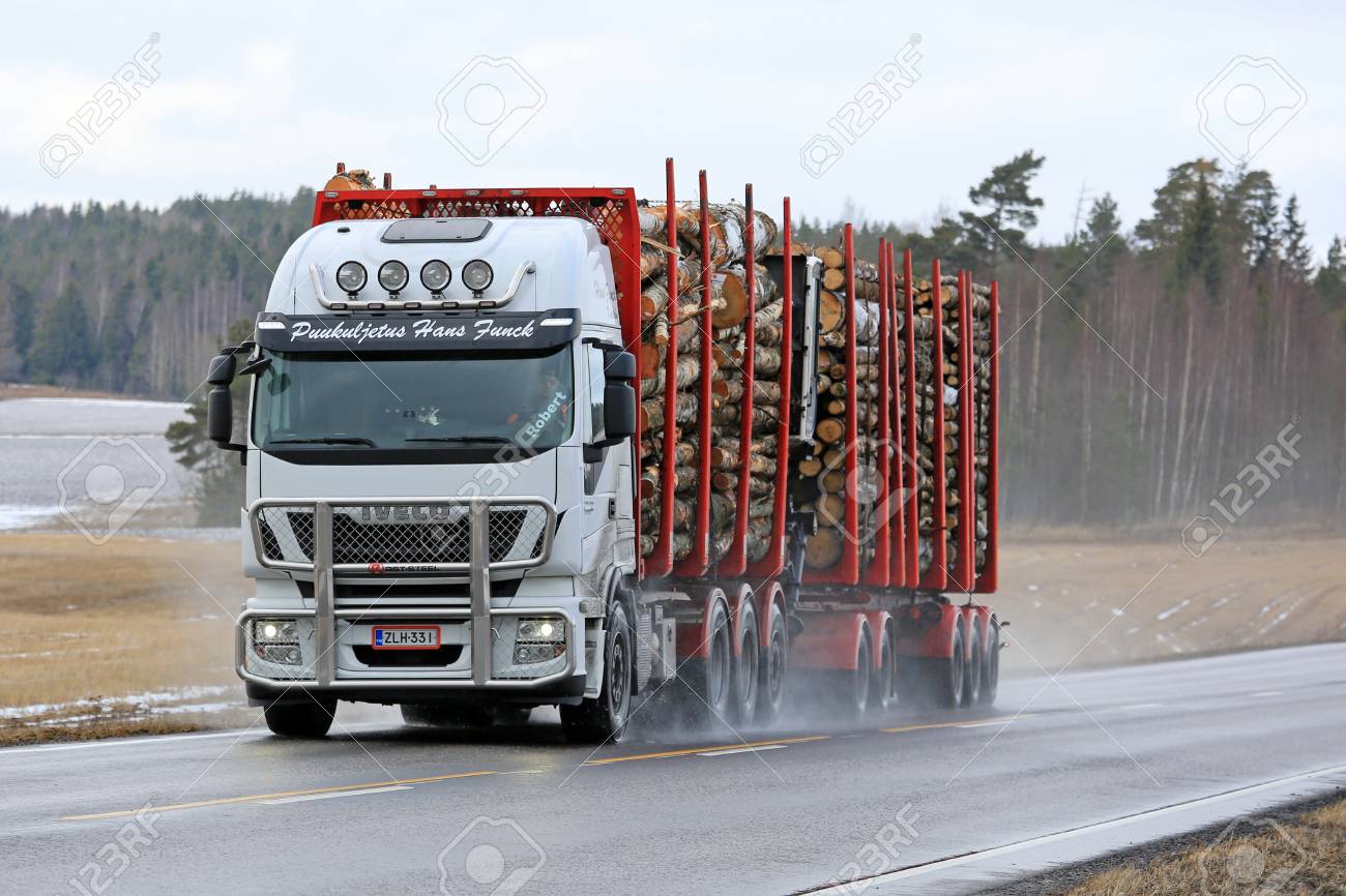 SALO, FINLAND - MARCH 4, 2017: White Iveco Stralis 560 logging truck of