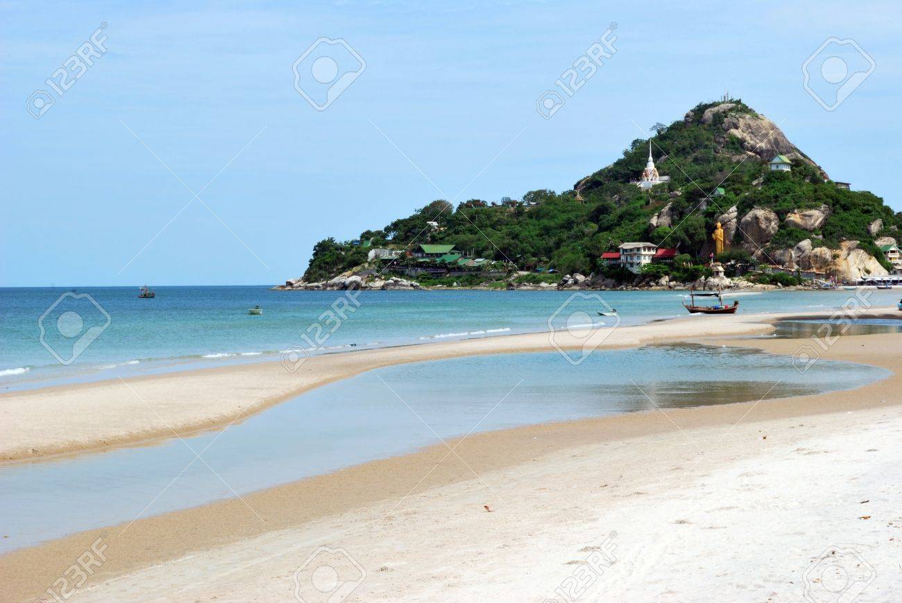 Beach With Mountain And Buddha Statue In Hua Hin Beach Thailand