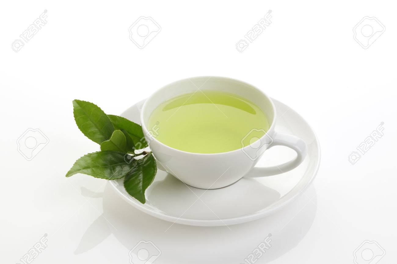 Japanese green tea and fresh green tea leaves on white background - 46190842 Japanese green tea and fresh green tea leaves on white background - 46190842