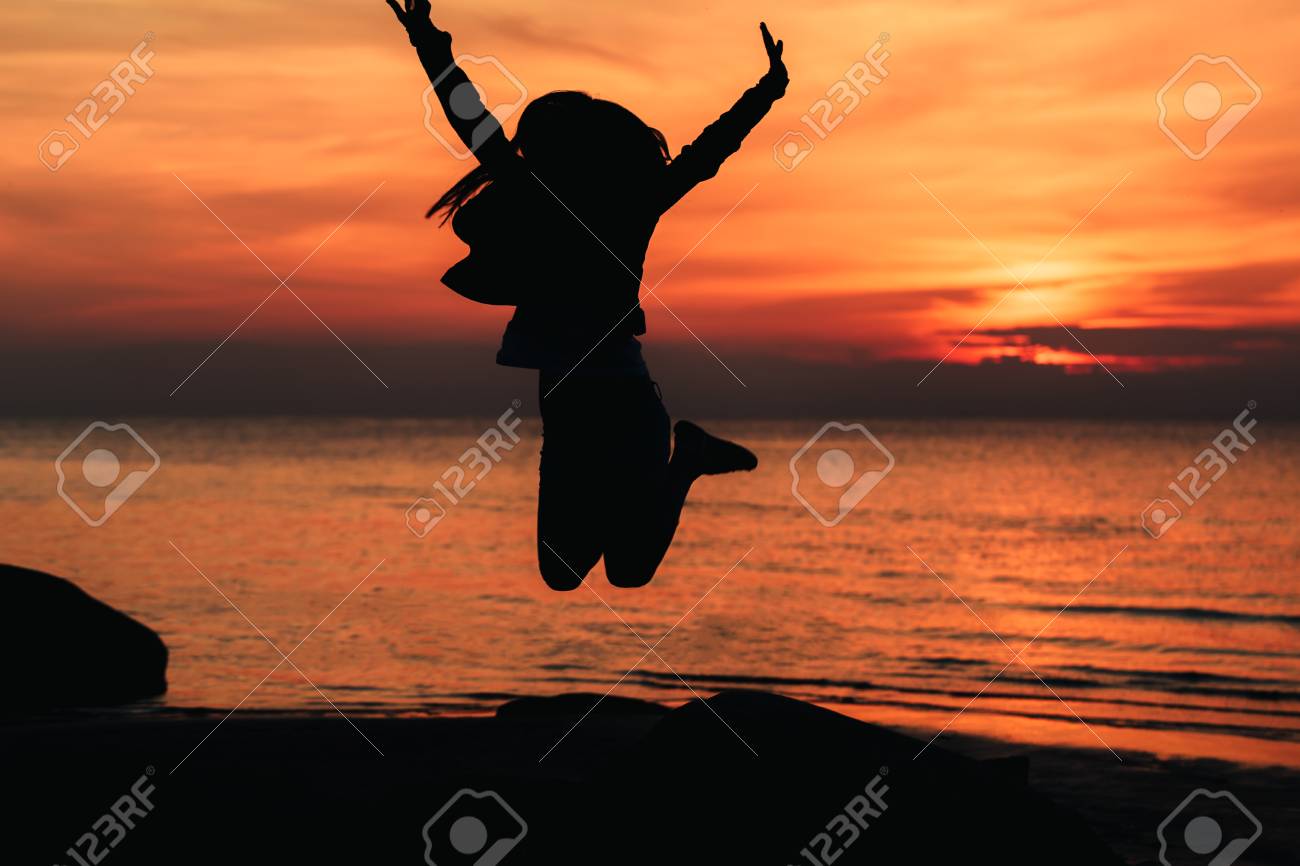 Happy Girl Jumping Against Beautiful Sunset. Freedom, Enjoyment Concept.  Stock Photo, Picture And Royalty Free Image. Image 46177848.