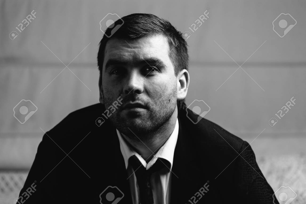 Serious man close up portrait black and white photography stock photo 70006723