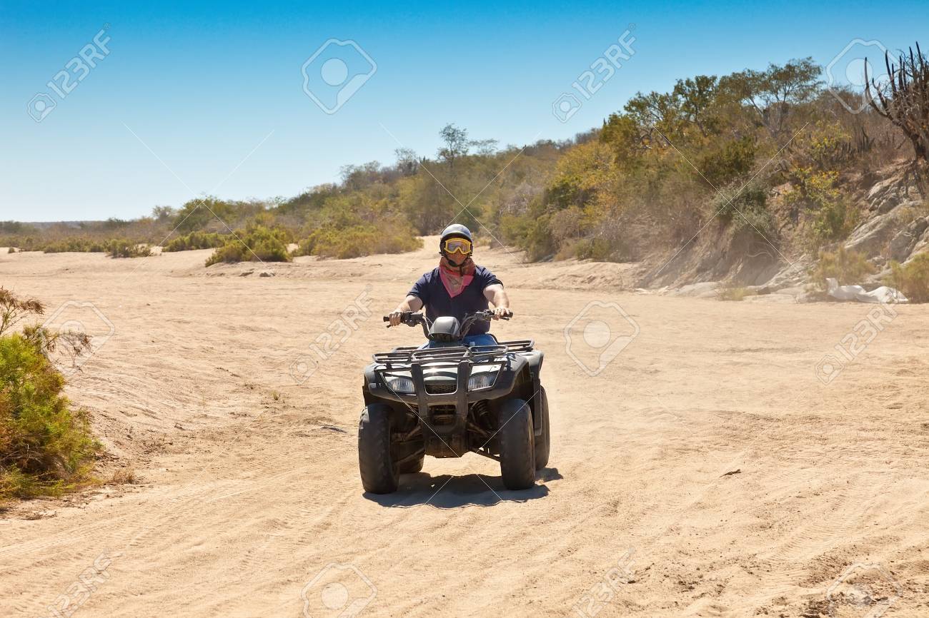 All Terrain Vehicle rider in Cabo San Lucas, Mexico - 22613266 All Terrain Vehicle rider in Cabo San Lucas, Mexico - 22613266