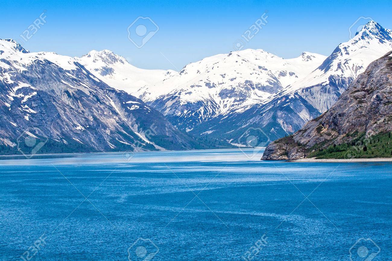 Mountain range and ocean waters in Glacier Bay National Park, Alaska - 34392130 Mountain range and ocean waters in Glacier Bay National Park, Alaska - 34392130