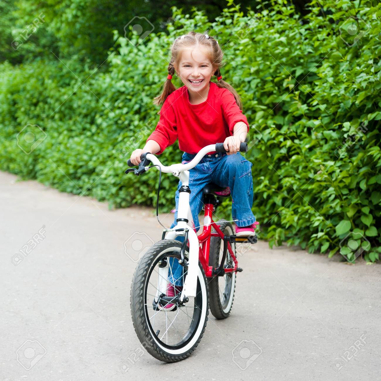 little girl on bicycle