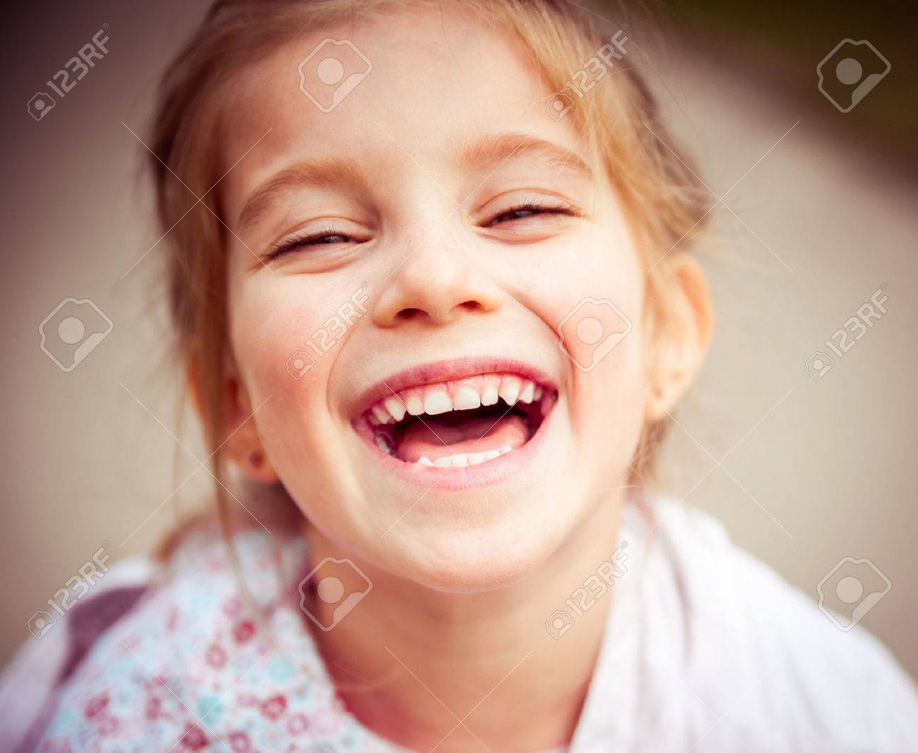 Portrait of a beautiful happy liitle girl close-up - 43021490 Portrait of a beautiful happy liitle girl close-up - 43021490