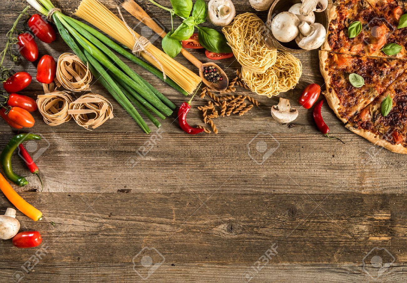 Italian food background with pizza, raw pasta and vegetables on wooden table - 44144439 Italian food background with pizza, raw pasta and vegetables on wooden table - 44144439