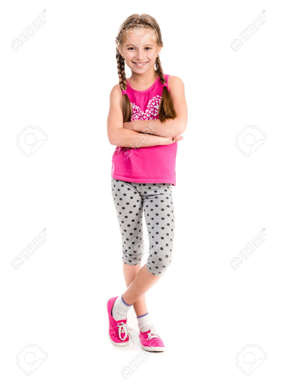 little girl standing with hands on sides doing fitness - 44481590 little girl standing with hands on sides doing fitness - 44481590