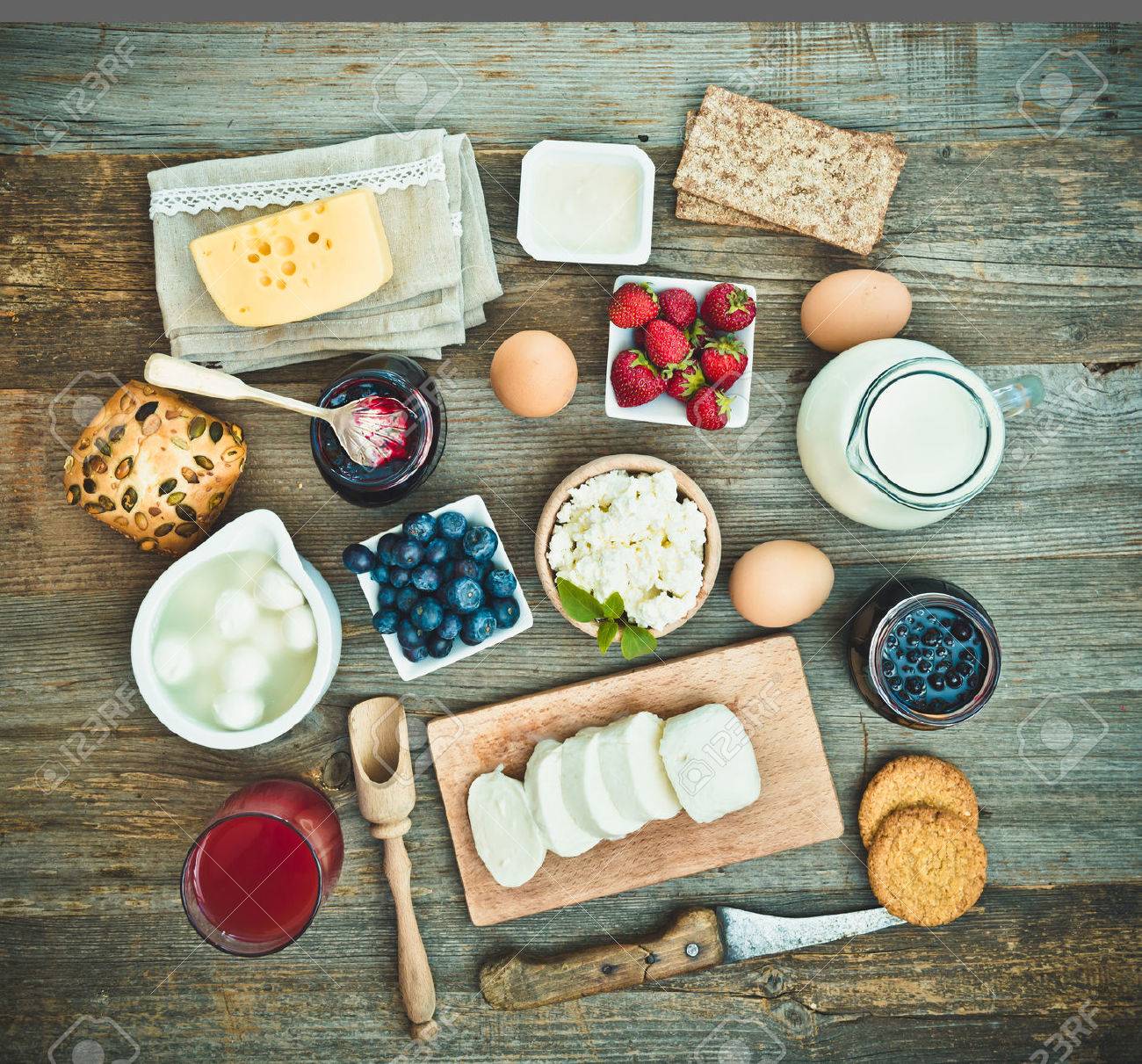 Summer breakfast. fruit and dairy products on a wooden table. top view - 47391524 Summer breakfast. fruit and dairy products on a wooden table. top view - 47391524