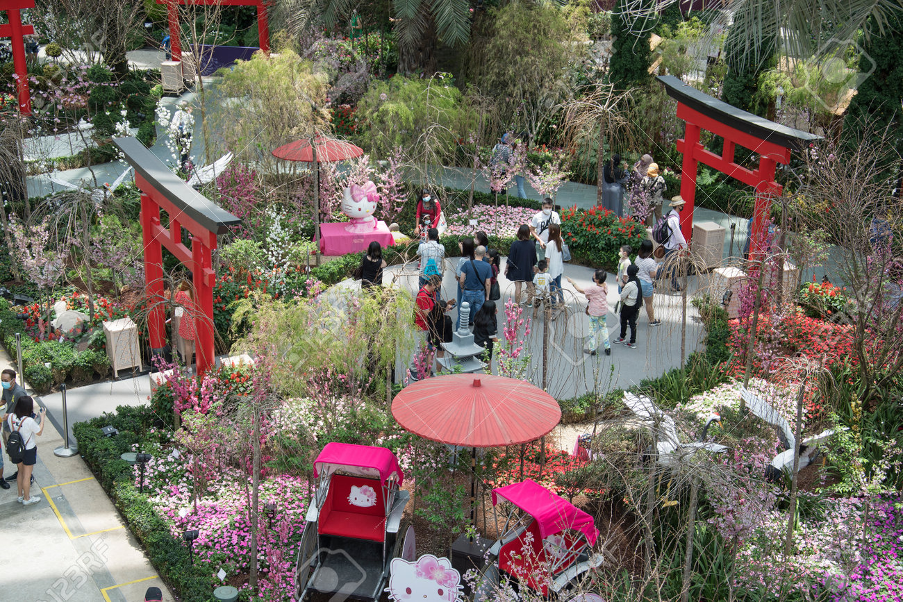 Singapore - Mar 19, 2021: People walk in the Gardens by the Bay Flower Dome pavillion in Singapore. - 166241409 Singapore - Mar 19, 2021: People walk in the Gardens by the Bay Flower Dome pavillion in Singapore. - 166241409