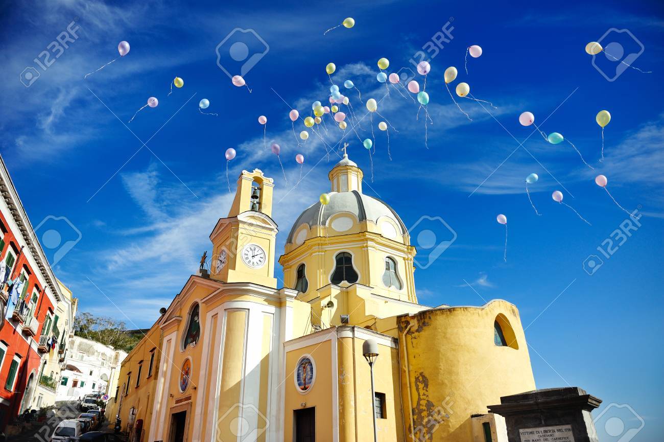 beautiful panoramic view of the colorful island of Procida in the Gulf of Naples, church of Procida, Mediterranean sea, Italy - 26403575 beautiful panoramic view of the colorful island of Procida in the Gulf of Naples, church of Procida, Mediterranean sea, Italy - 26403575