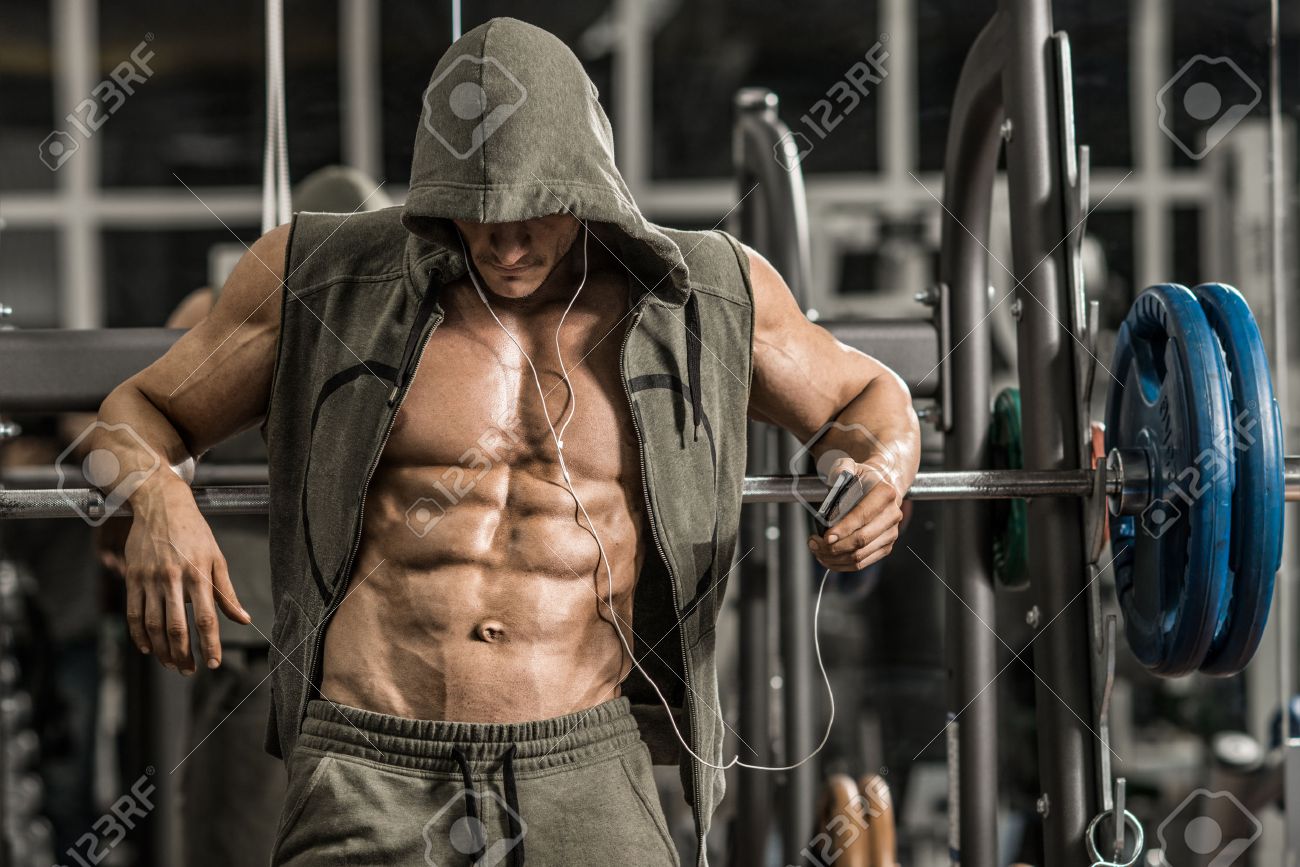 Guy Bodybuilder Tired In Gym And Listen Music With Headset Stock Photo Picture And Royalty Free Image Image 47694206