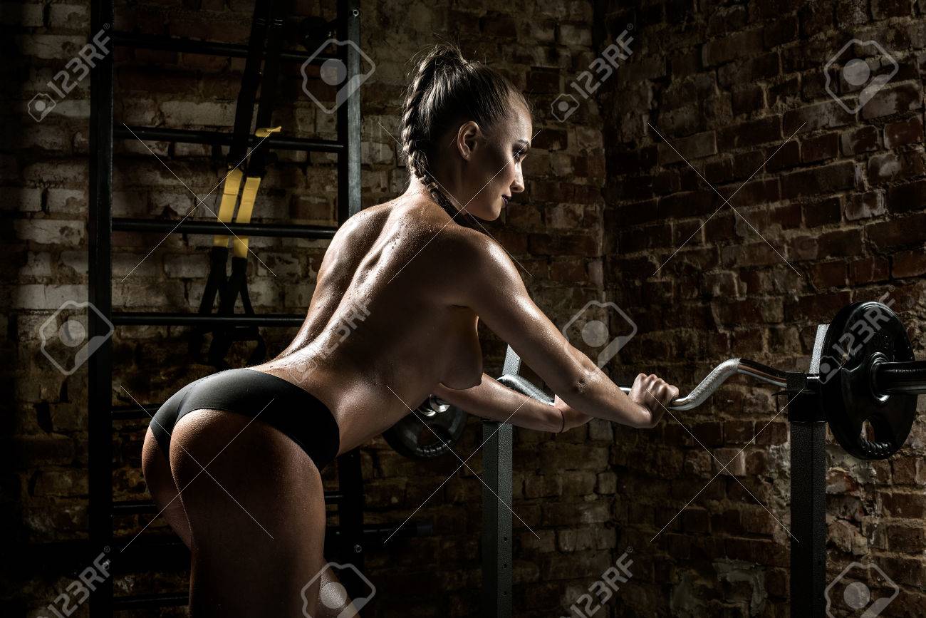 Young Fitness Woman Topless In Gym On Brick Background, Horizontal Photo  Stock Photo, Picture and Royalty Free Image. Image 71829285.