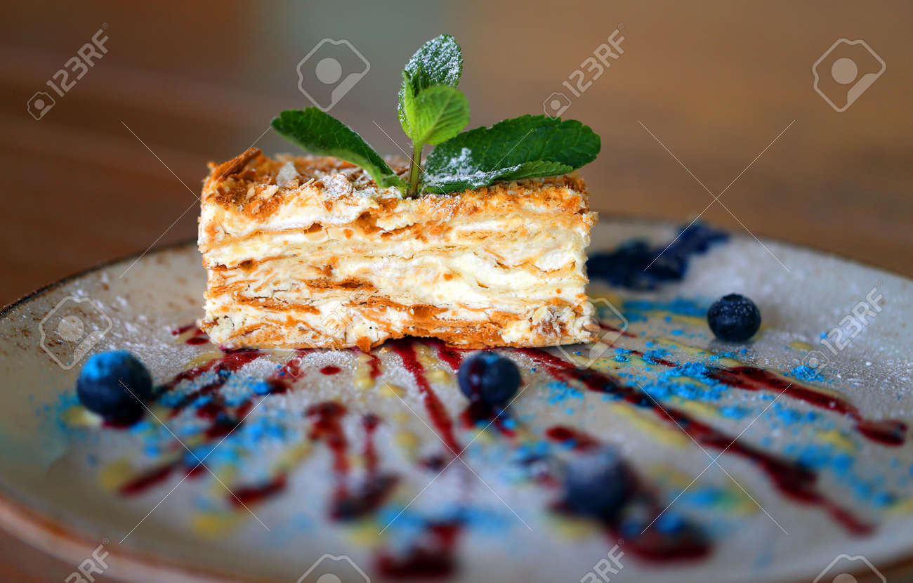Photo macro of a piece of sweet cake with berries - 163071867 Photo macro of a piece of sweet cake with berries - 163071867