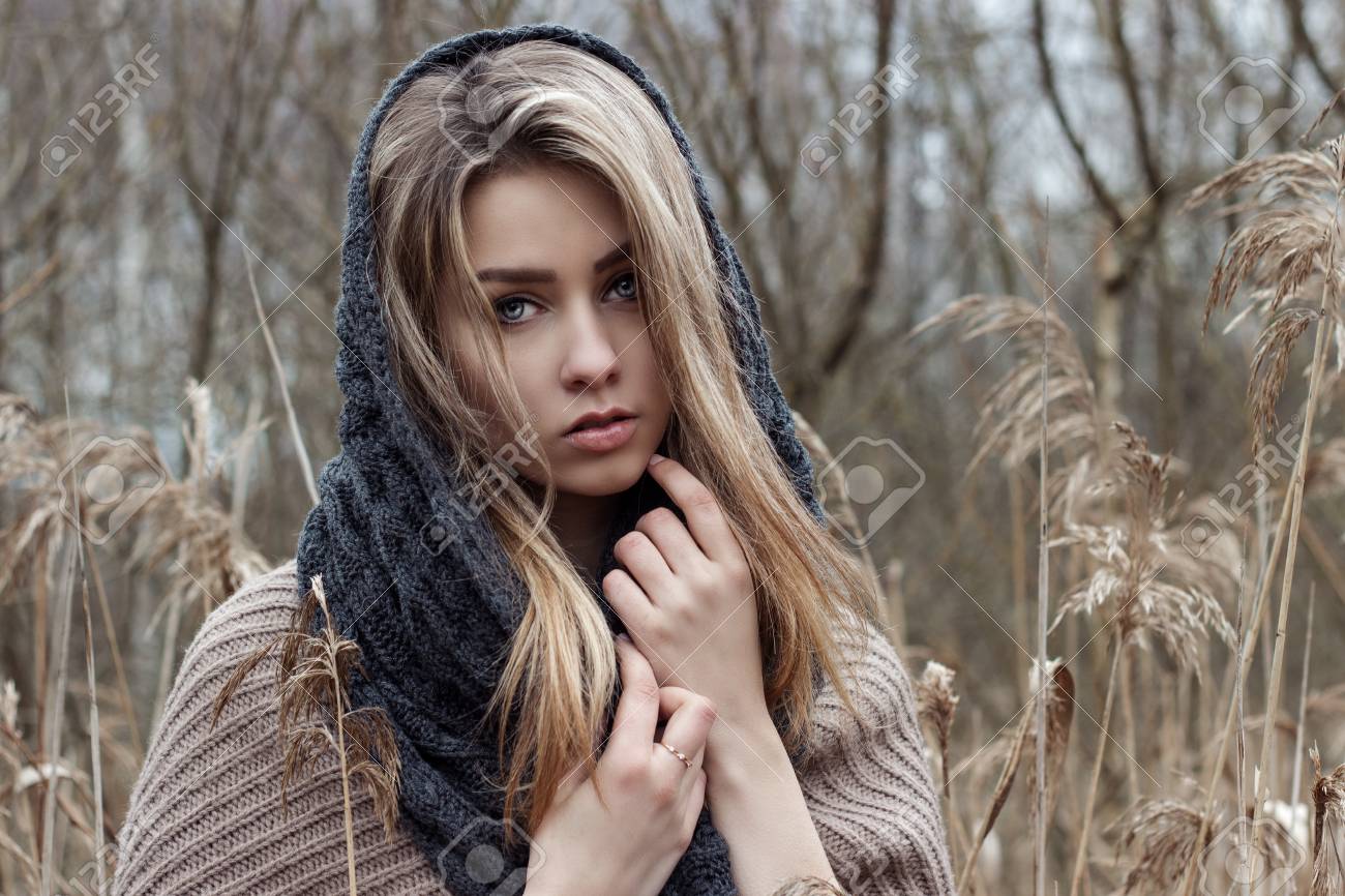 Beautiful Sad Girl Is Walking In The Field. Photo In Brown Tones ...