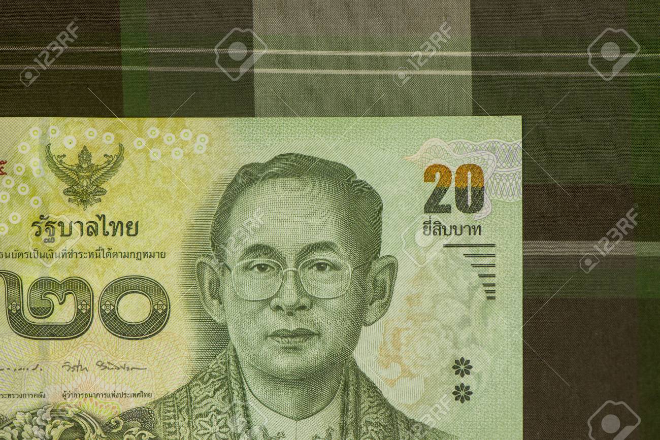 タイの紙幣タイ タイ国王の画像入りのクローズ アップ スコットランドの緑の布で バーツのタイの紙幣 タイの通貨の概念等機密性の高いフォーカス の写真素材 画像素材 Image タイの紙幣タイ タイ国王の画像入りのクローズ アップ スコットランドの緑の布で バーツのタイの紙幣 タイの通貨の概念等機密性の高いフォーカス の写真素材 画像素材 Image