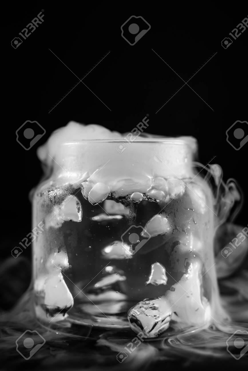Dry Ice Cubes Dropped Into A Glass Jar Starting To Creat Smoke Stock Photo Picture And Royalty Free Image Image 148164415