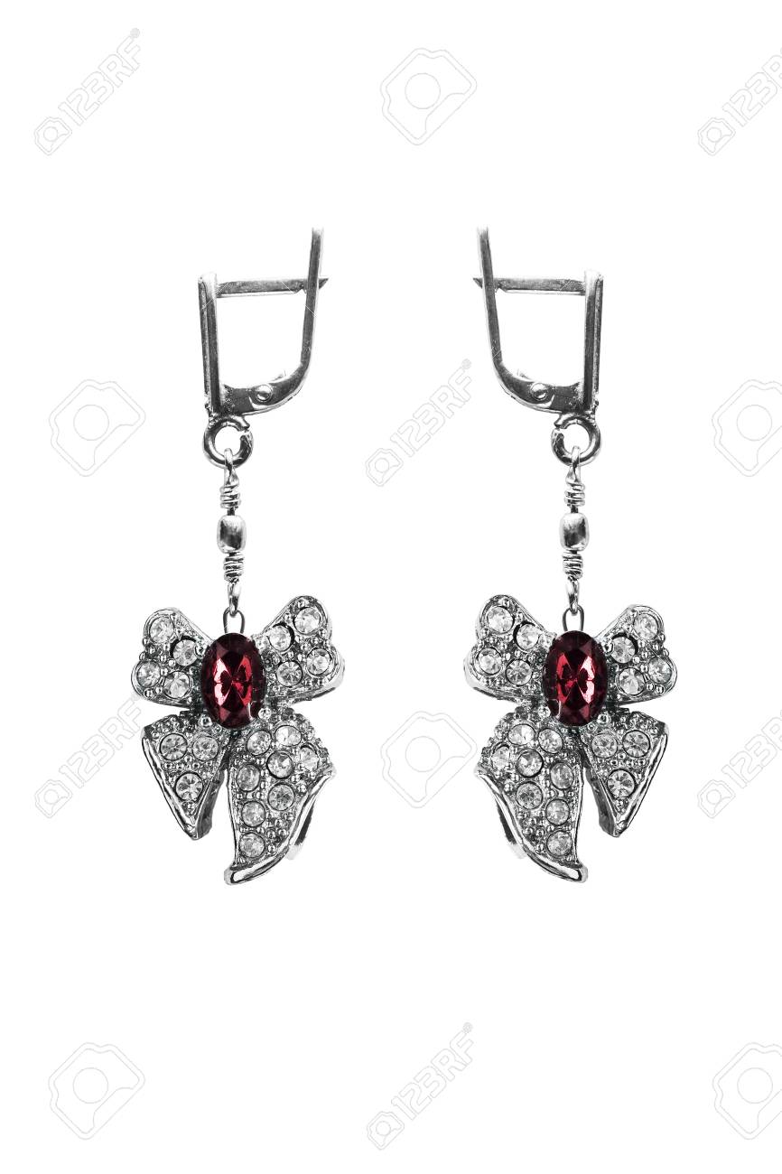 白い背景の上の弓の形をしたルビー ピアス の写真素材 画像素材 Image