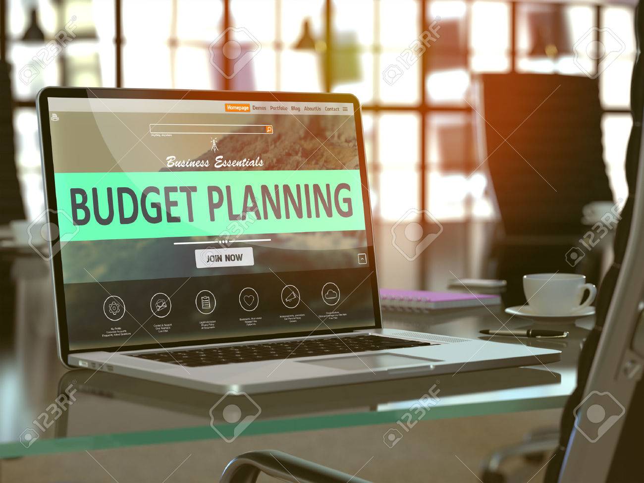 Modern Workplace with Laptop showing Landing Page with Budget Planning Concept. Toned Image with Selective Focus. - 50518196 Modern Workplace with Laptop showing Landing Page with Budget Planning Concept. Toned Image with Selective Focus. - 50518196