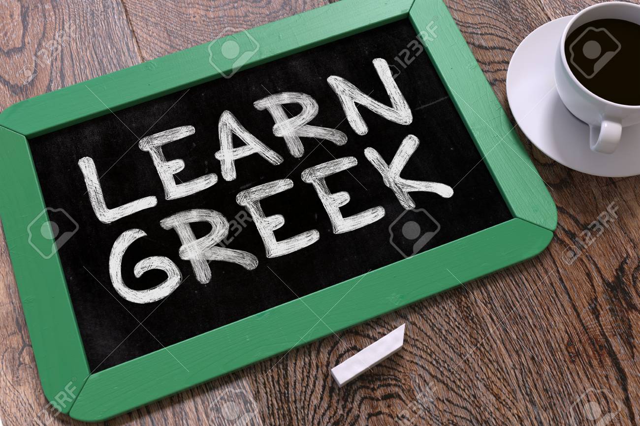 learn greek handwritten by white chalk on a blackboard composition