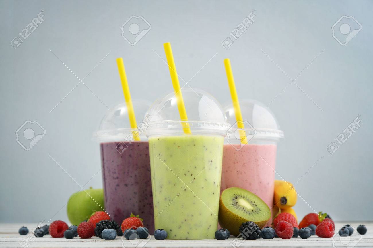 Download Fruit Smoothies In Plastic Cups With Blueberry Strawberry Kiwi Stock Photo Picture And Royalty Free Image Image 61784912