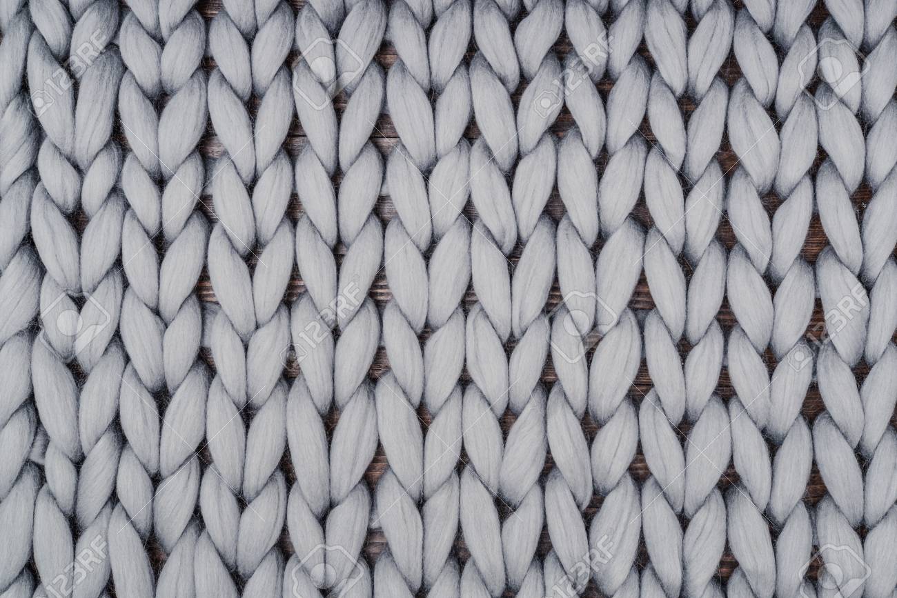 Gray Knitted Blanket From Merino Wool, Super Chunky Yarn. May Used As Background. Stock Photo, Picture And Royalty Free Image. Image 99710362. Gray Knitted Blanket From Merino Wool, Super Chunky Yarn. May Used As Background. Stock Photo, Picture And Royalty Free Image. Image 99710362.
