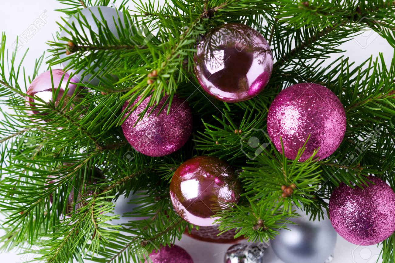 Christmas Background With Green Fir Branches, Glitter Magenta, Pink And  Silver Baubles Garland Stock Photo, Picture And Royalty Free Image. Image  91732653.