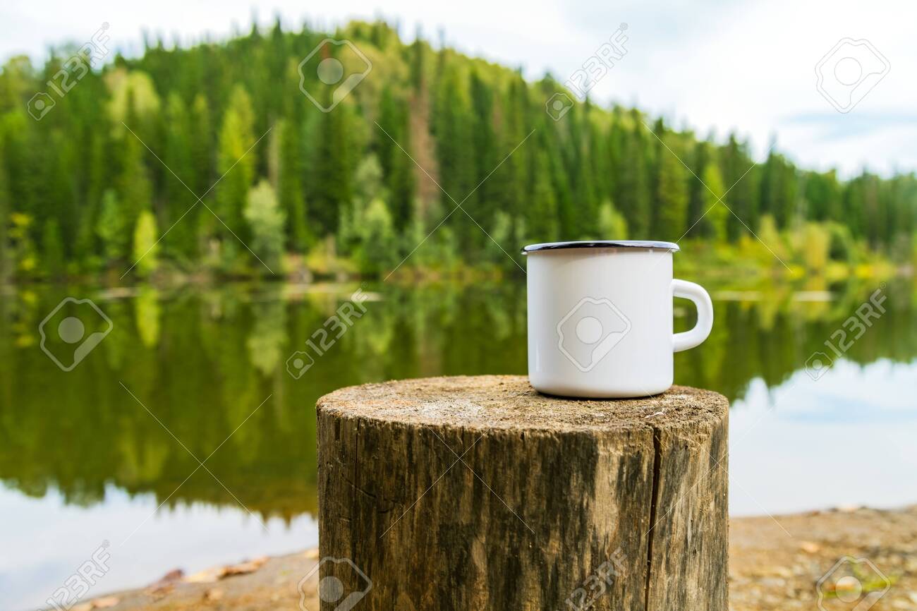 Download White Campfire Enamel Coffee Mug Mockup Witn The Tree Stump And Stock Photo Picture And Royalty Free Image Image 144700823