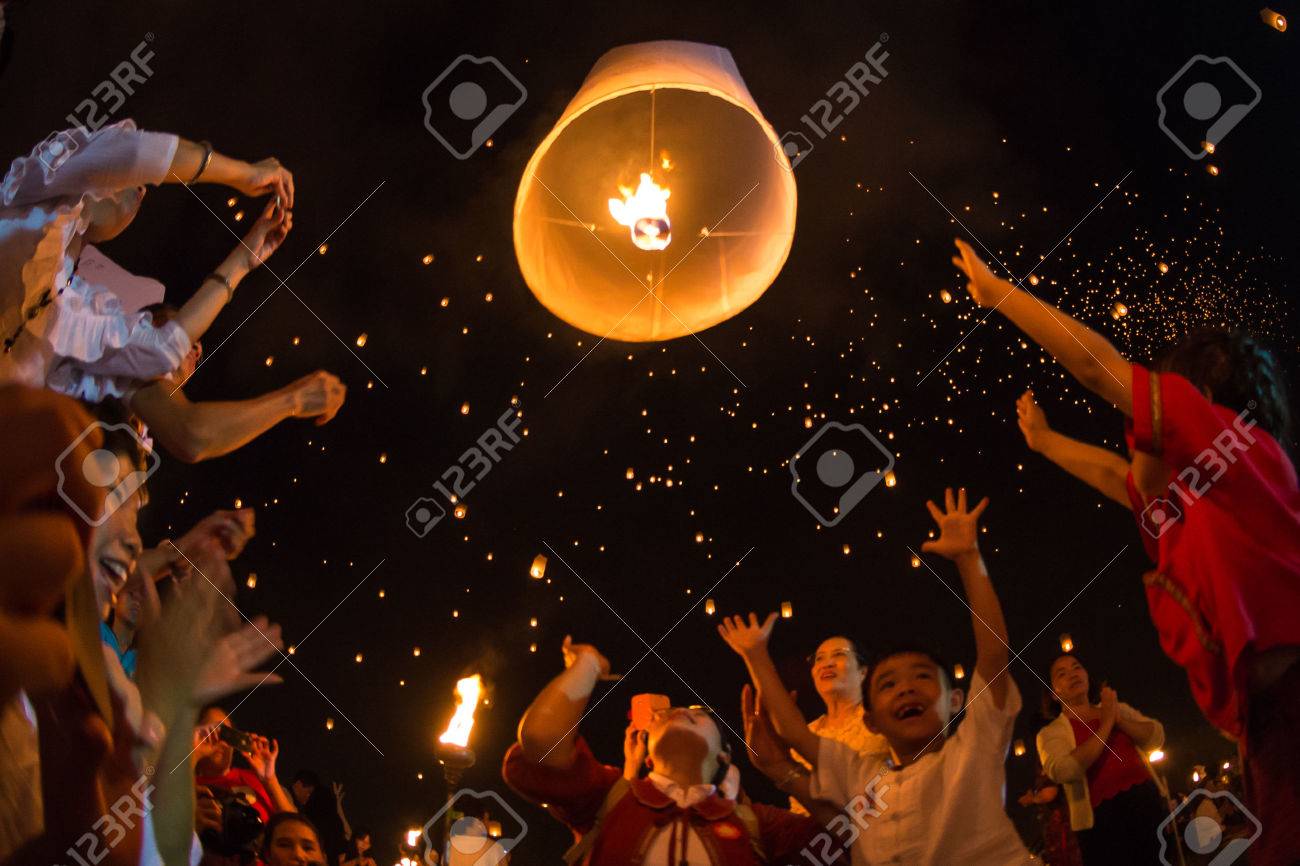 CHIANGMAI - November 16 Unidentified People launch sky lanterns to the sky in Loy Kratong festival on November 16,2013 in Chiangmai,Thailand - 24047967 CHIANGMAI - November 16 Unidentified People launch sky lanterns to the sky in Loy Kratong festival on November 16,2013 in Chiangmai,Thailand - 24047967