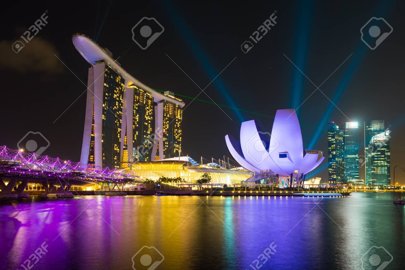 marina bay sands hotel with laser lighting show singapore cityscape