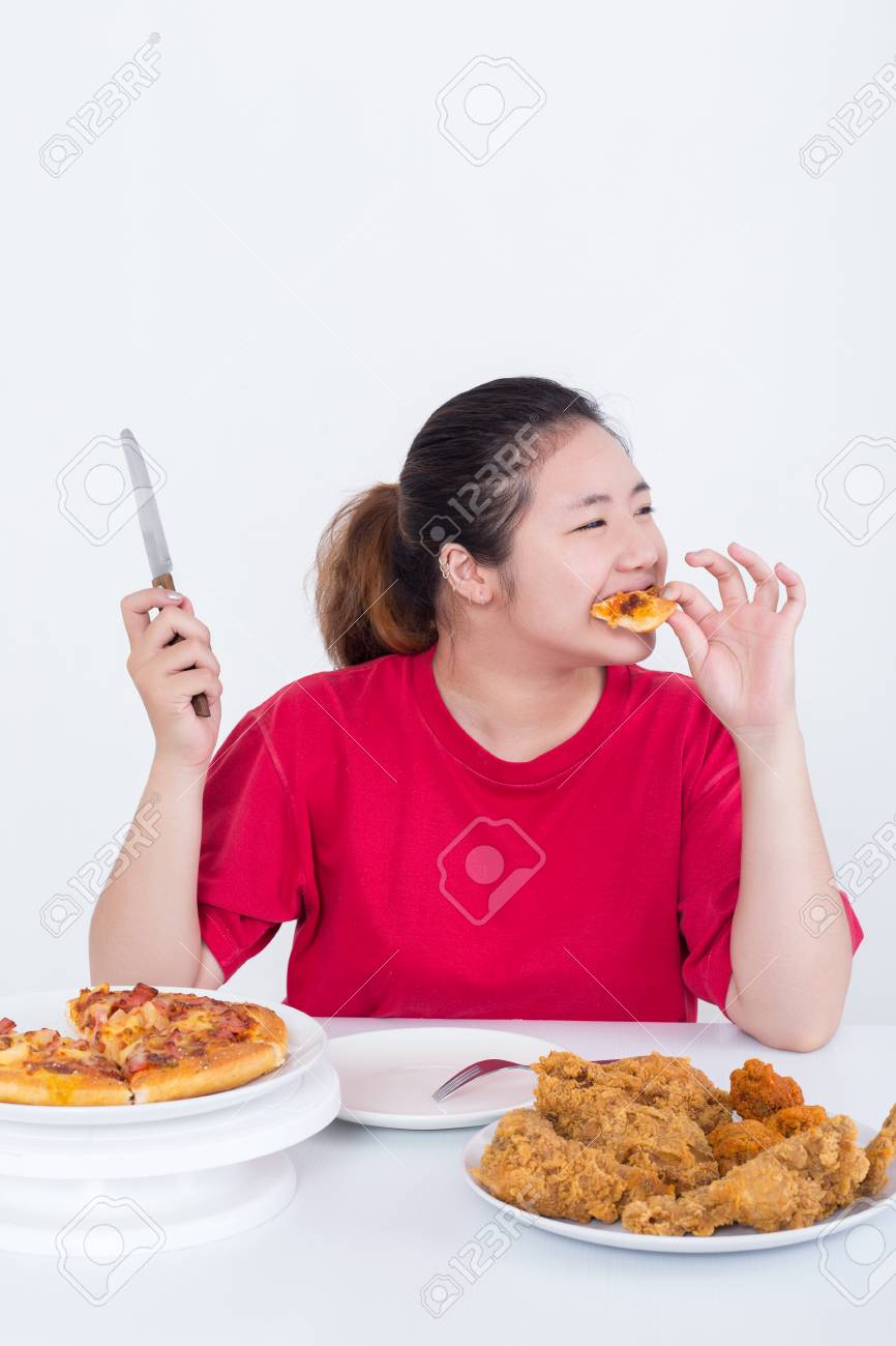 ファーストフードのカロリーの高い食品のコンセプトを持つ女性 の写真素材 画像素材 Image ファーストフードのカロリーの高い食品のコンセプトを持つ女性 の写真素材 画像素材 Image