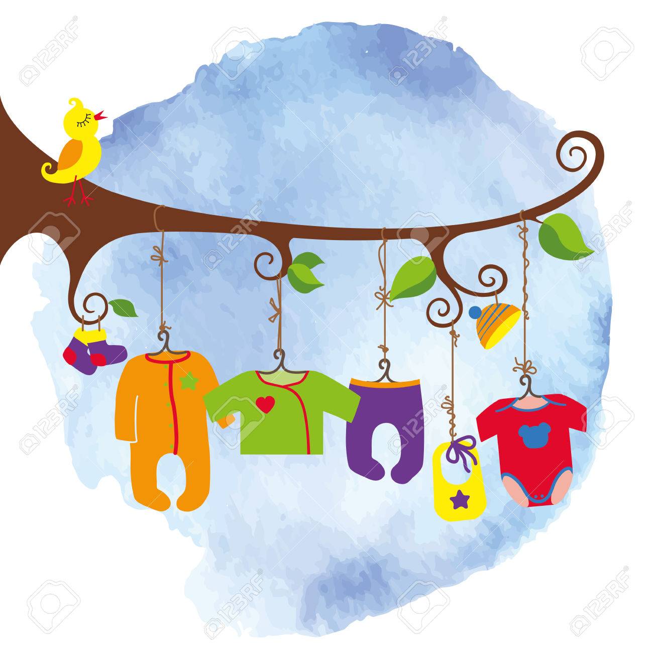 colorful newborn baby clothes hanging on rope in the tree branches
