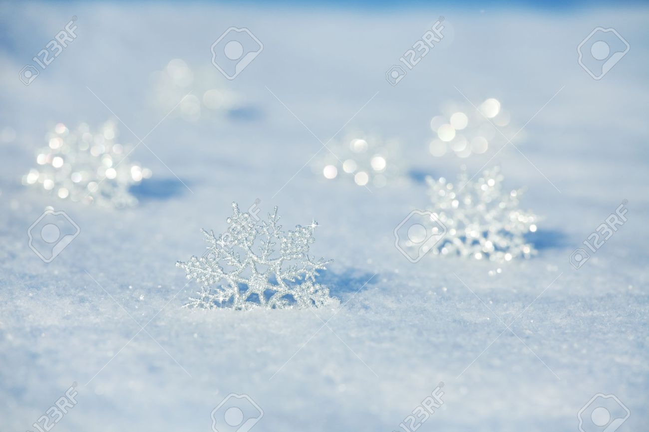 winter background snowflakes on snow stock photo picture and winter picture background