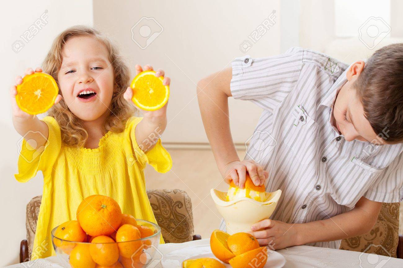 Children With Oranges Kids Squeezed Orange Juice Stock Photo Picture And Royalty Free Image Image 17534572