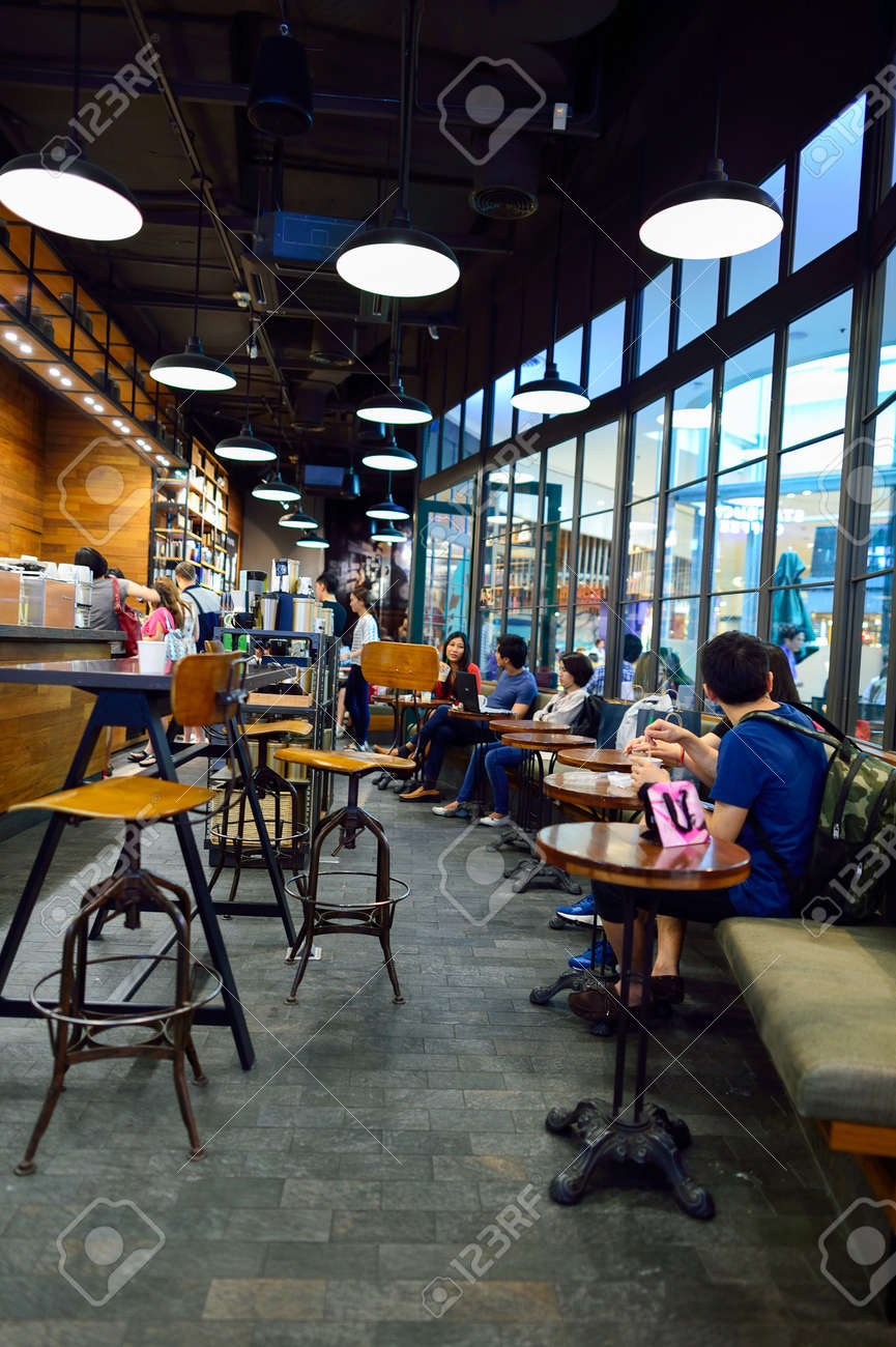 BANGKOK, THAILAND - JUNE 21, 2015: Starbucks Cafe Interior ... BANGKOK, THAILAND - JUNE 21, 2015: Starbucks Cafe Interior ...