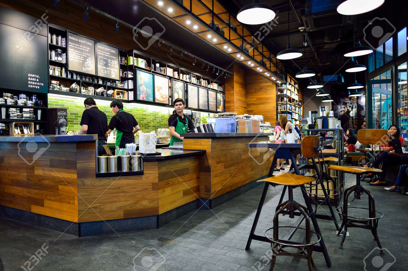 BANGKOK, THAILAND - JUNE 21, 2015: Starbucks Cafe Interior ... BANGKOK, THAILAND - JUNE 21, 2015: Starbucks Cafe Interior ...