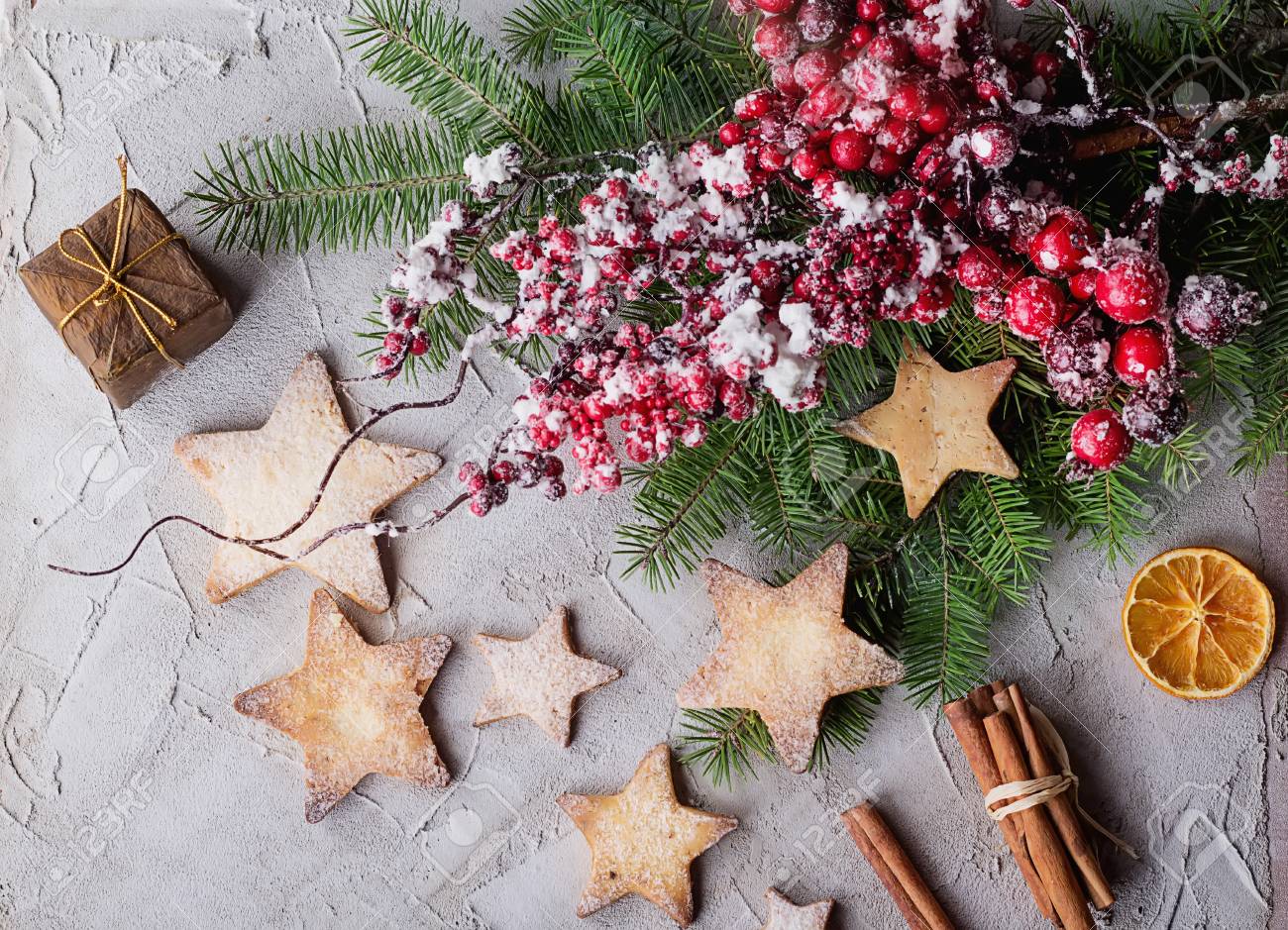 freshly cooked christmas star cookies over a grey background stock christmas star cookie