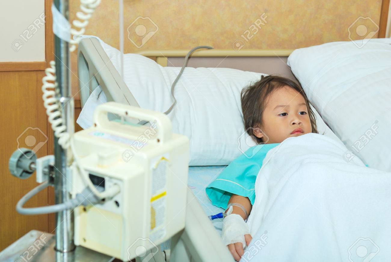 Sick Little Girl In Hospital Bed Stock Photo, Picture And Royalty Free  Image. Image 30227571.