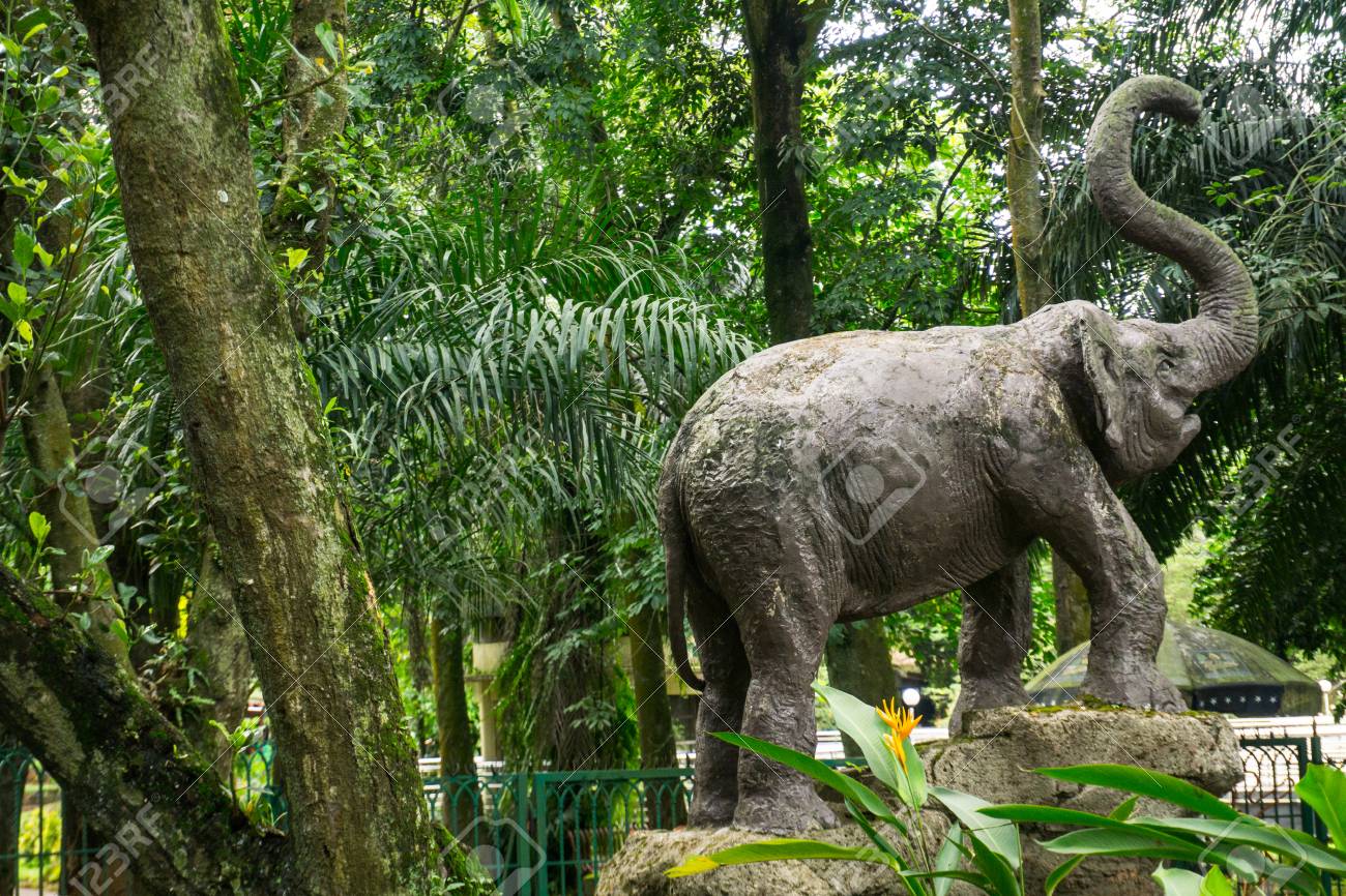 Elephant Statue Made From Concrete Standing In The Middle Of