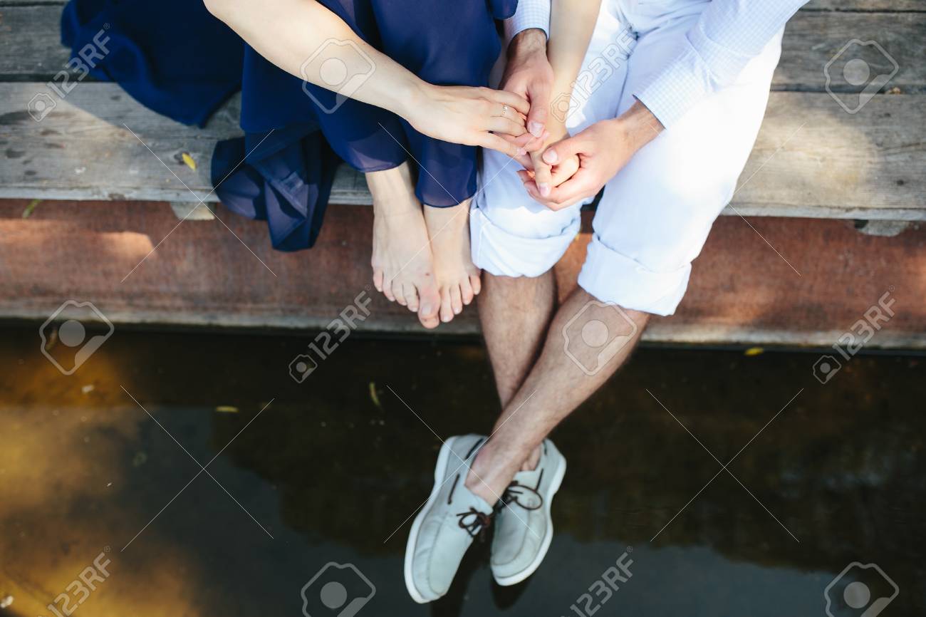 man and woman at the lake to spend time in each other's arms - 43424305 man and woman at the lake to spend time in each other's arms - 43424305