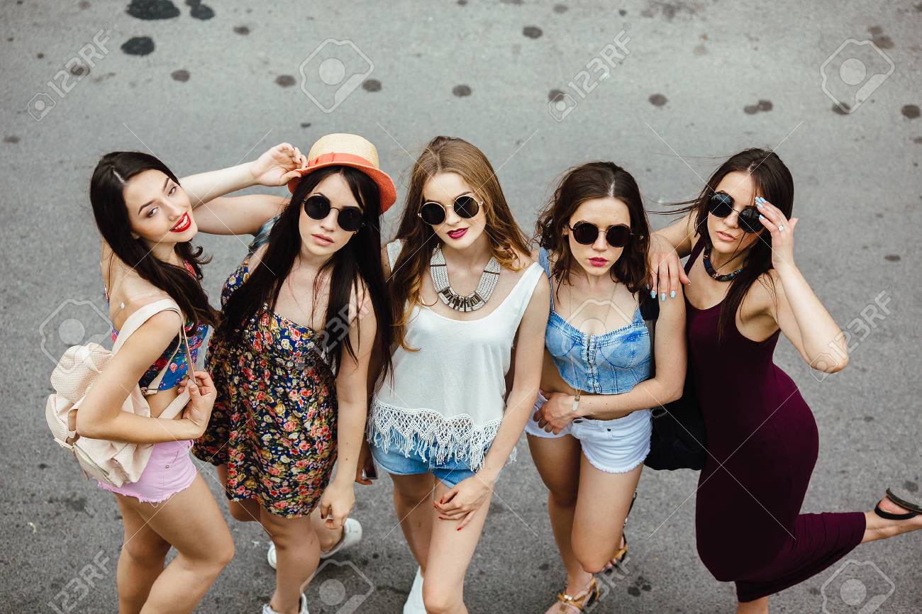 Five young beautiful girls having fun outdoors - 45197941 Five young beautiful girls having fun outdoors - 45197941