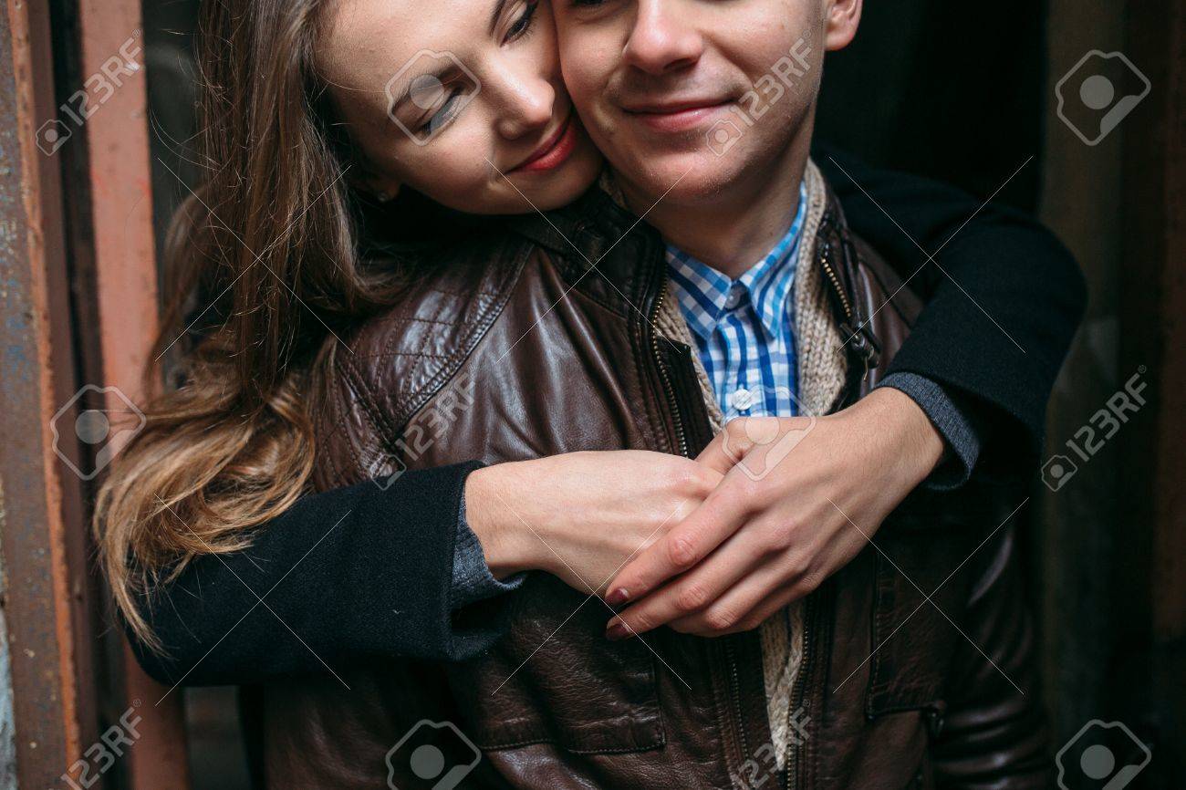 Girl hugging guy from behind