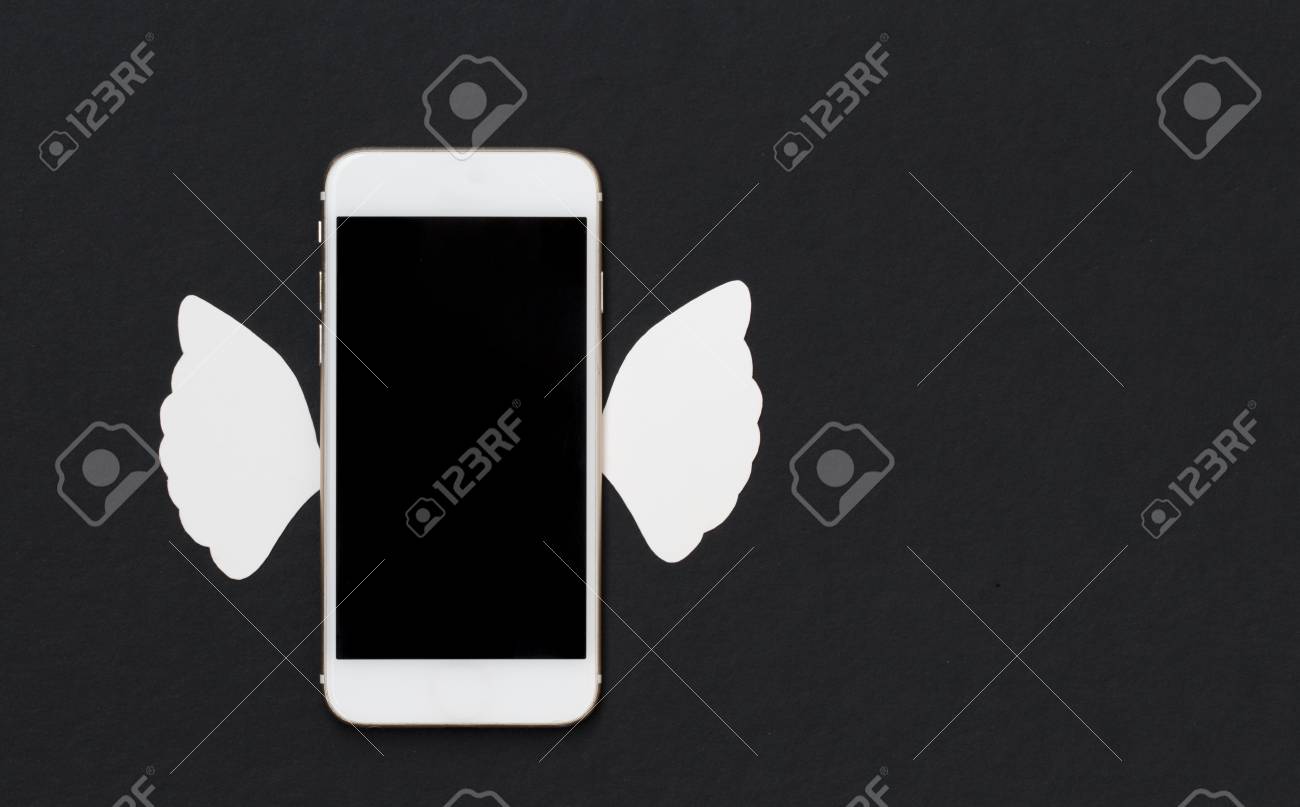white phone with white angel wings on black background smartphone