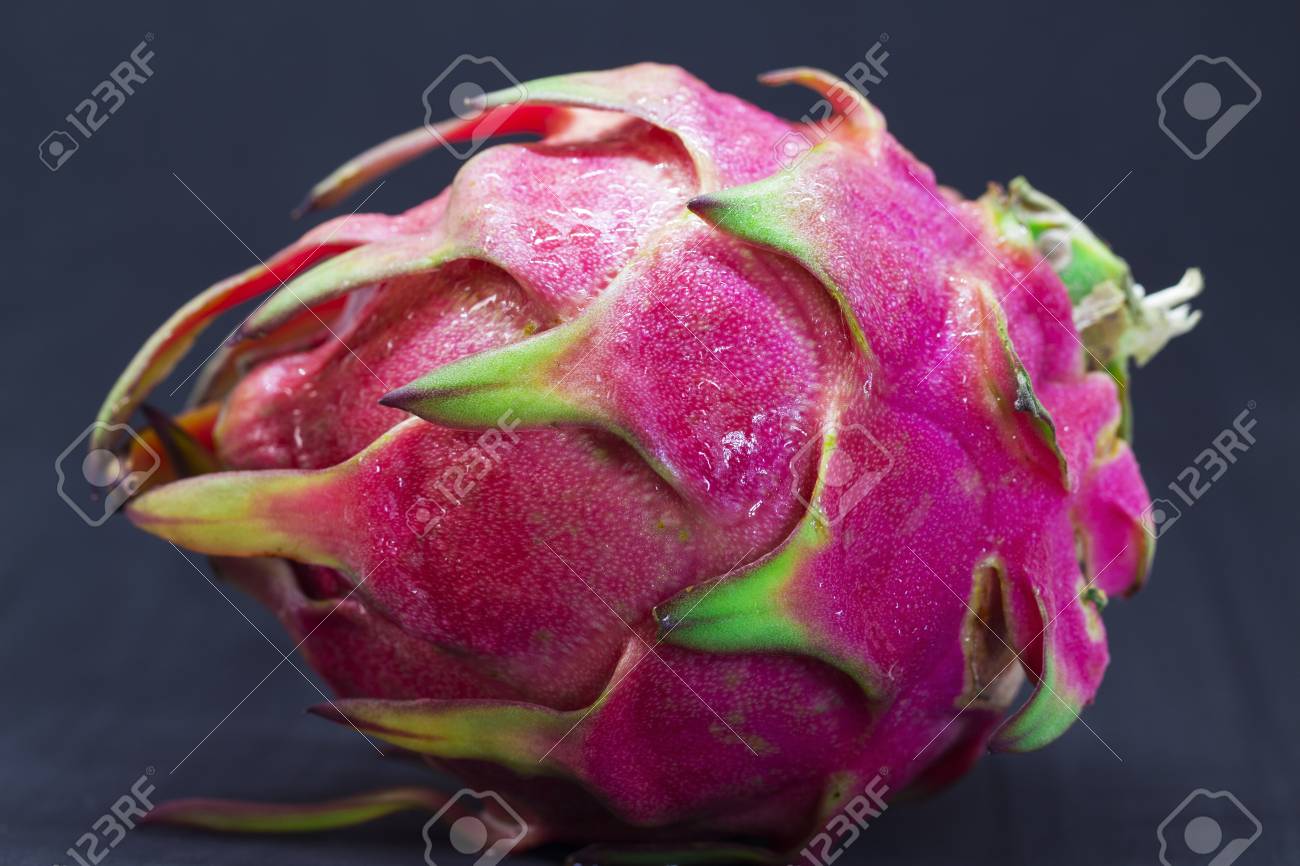 Exotic Fruit Dragonfruit With Pink And Green Skin On Black Background Vibrant Exotic Fruit Banner Template Dragon Fruit Or Pitahaya Studio Photo Thailand Fruit With Unusual Skin Pitahaya Whole Stock Photo Picture