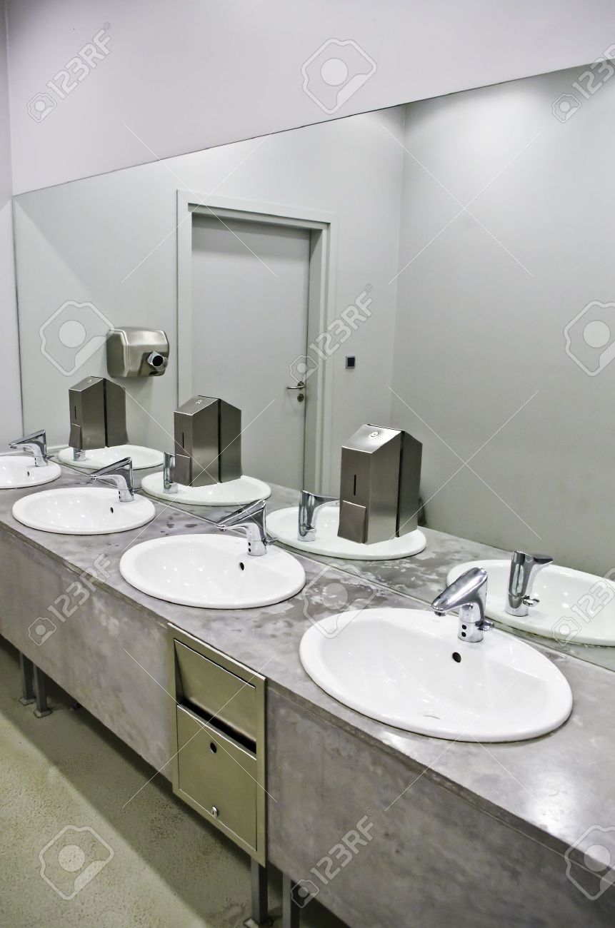 Public Bathroom Sink sinks in the public toilet stock photo, picture and royalty free Public Bathroom Sink sinks in the public toilet stock photo, picture and royalty free