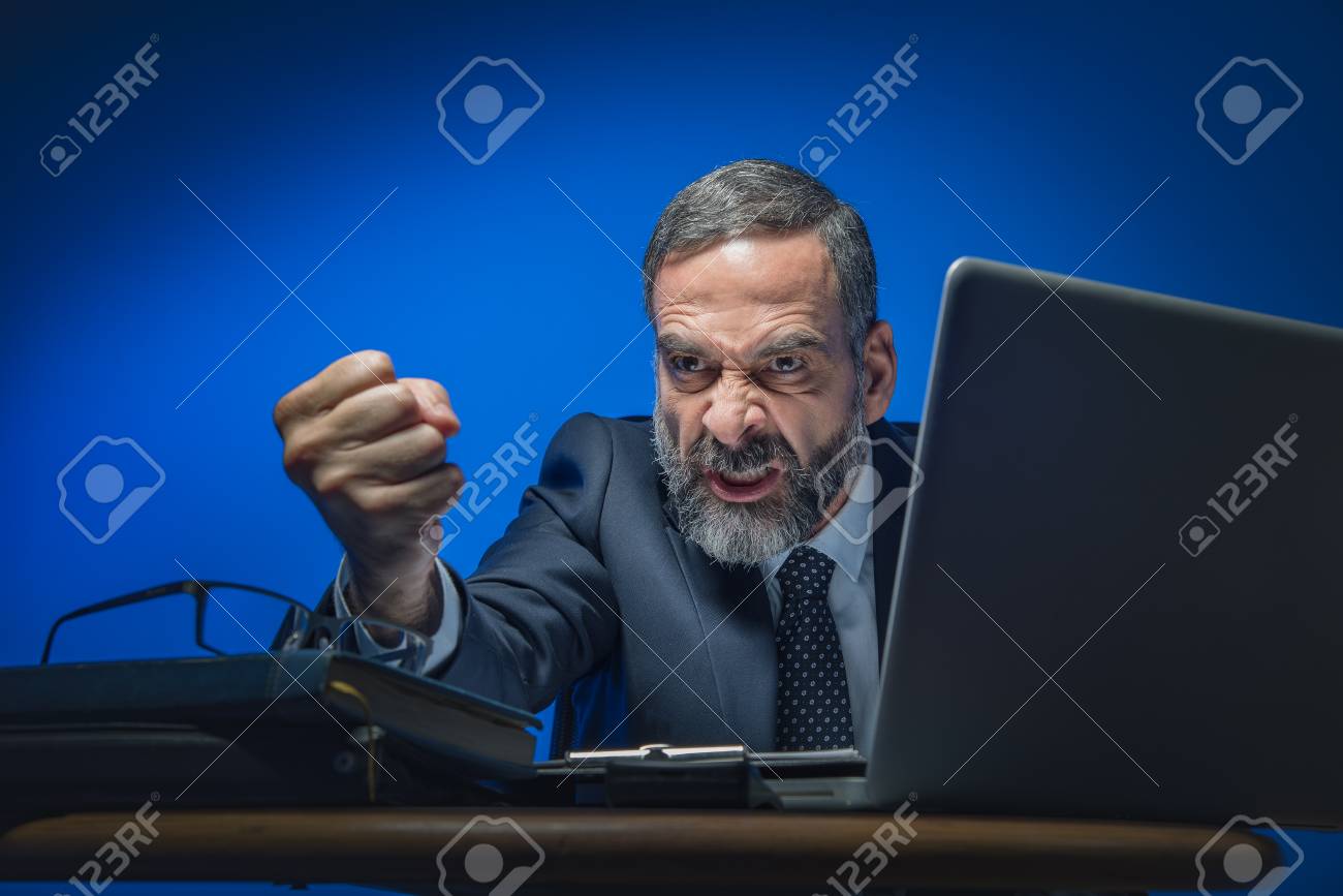 Image result for angry business man clenching his fist