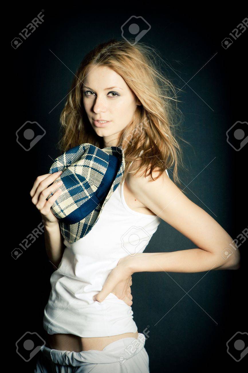 Beautiful Young Female Model in Studio with hat - 6233167 Beautiful Young Female Model in Studio with hat - 6233167