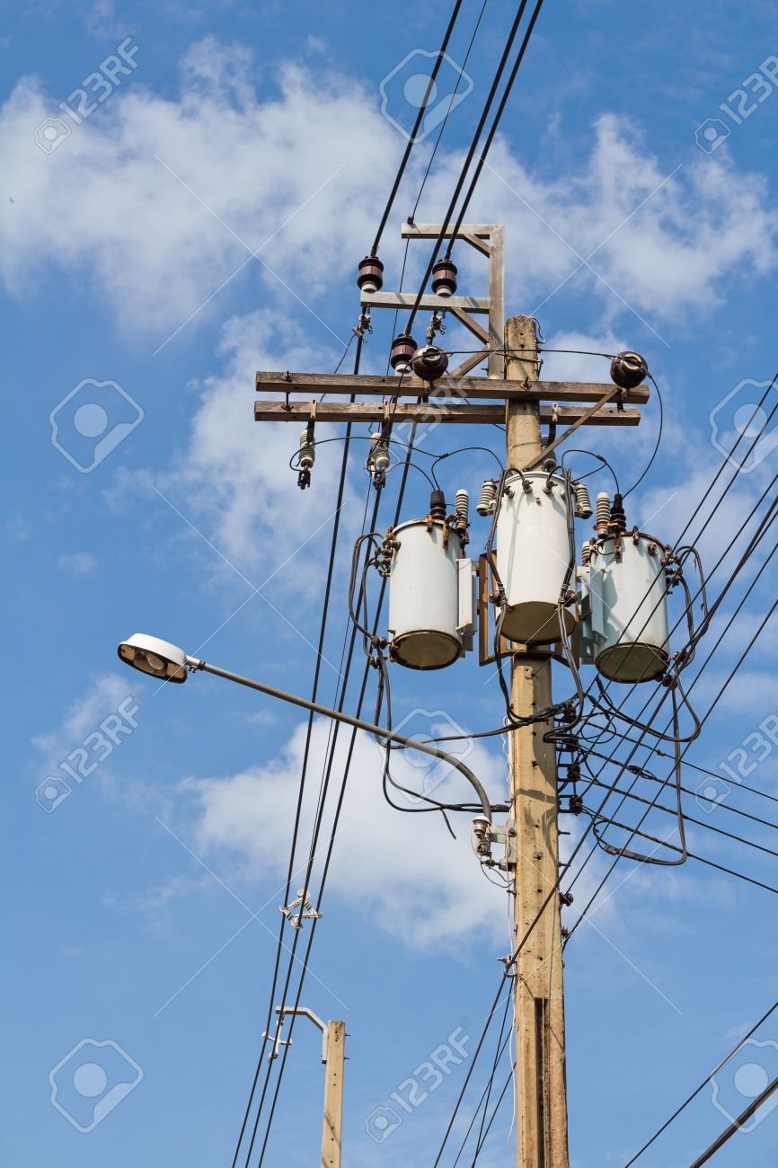 26080796-three-pole-mounted-single-phase-oil-immersed-transformers-on-concrete-pole-bank-as-a-three-phase-tra.jpg