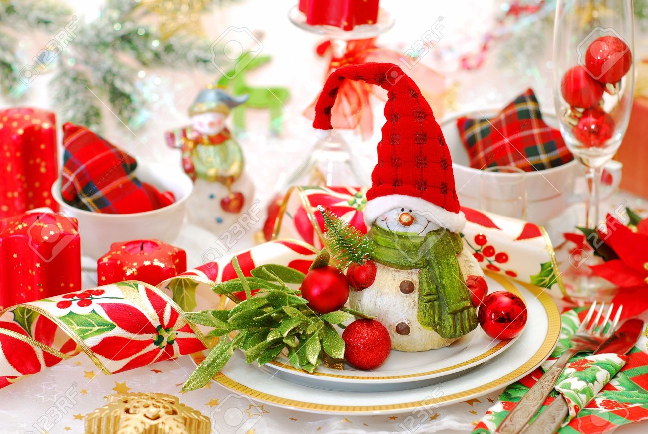 Christmas Table Set With Funny Snowman In Red Cap On The Plate Stock ... Christmas Table Set With Funny Snowman In Red Cap On The Plate Stock ...